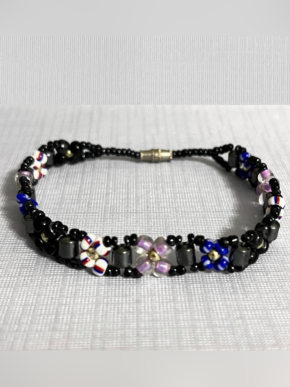 Handmade Black Seed Bead Bracelet with Multicolor Flower Accents